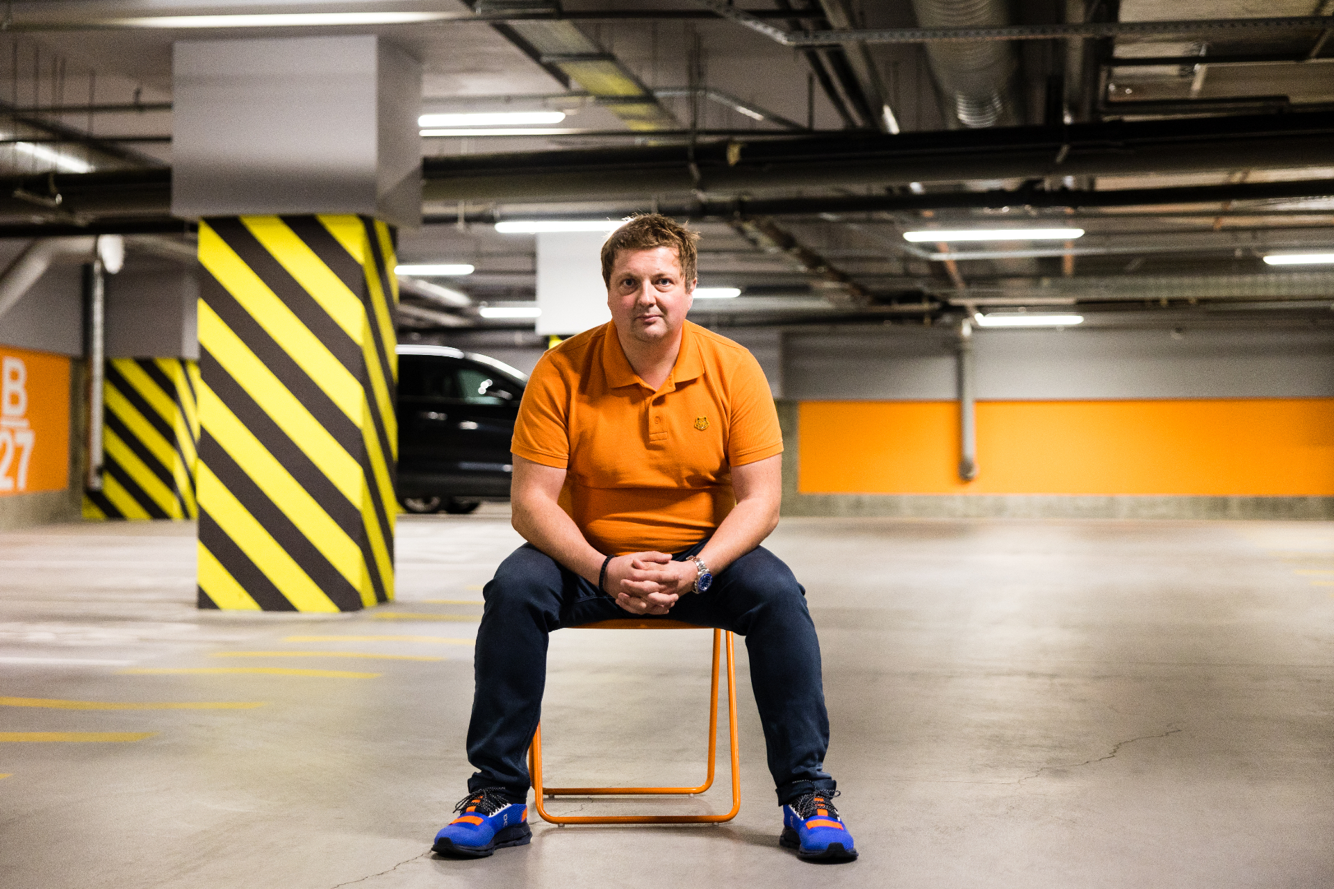 Andrew Pavliv, N-iX founder, seated in an underground car park in Lviv.